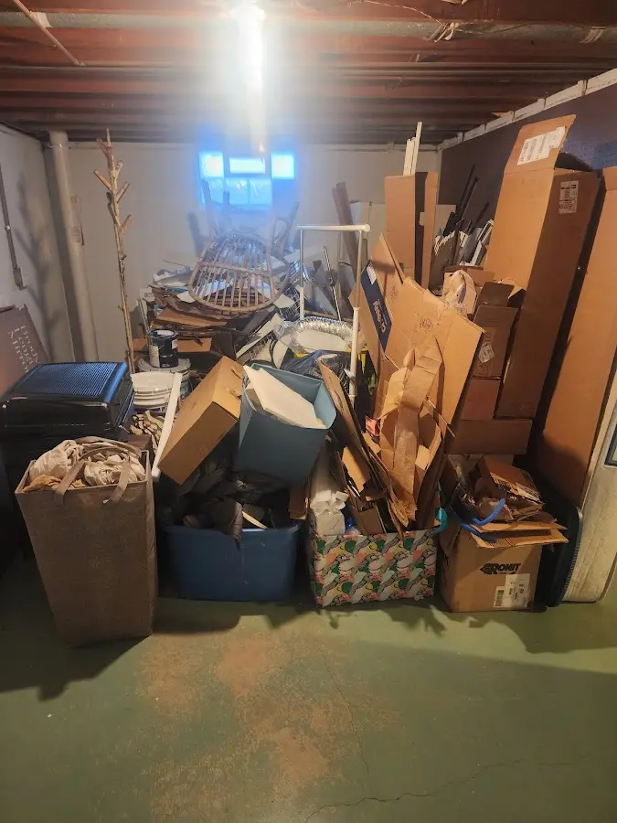 Roll-off dumpster container at job site for Yard Waste Dumpster Rental in Monroe